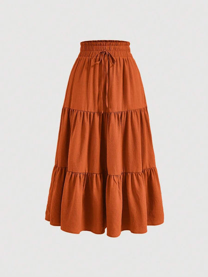 LEONOR. Saia Midi Evasê em Linho | Terracota | Estilo Boho Verão