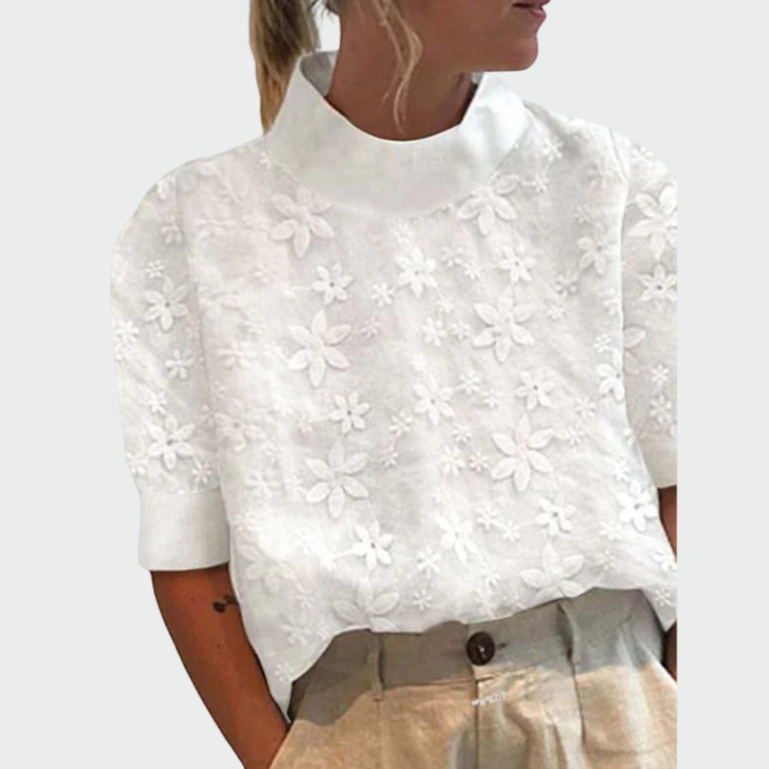 Blusa de bordado con cuello alto